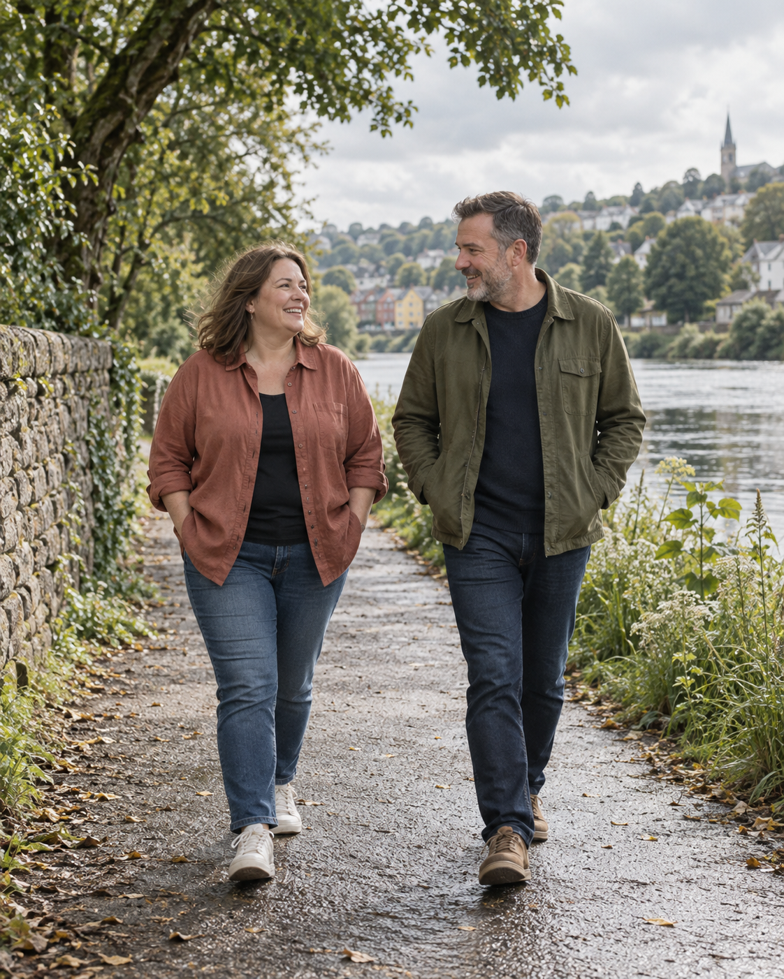 Illustrative scene of two adults walking beside a river